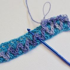 a crochet hook with yarn on it