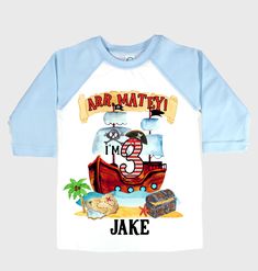 a white and blue shirt with an image of a pirate ship on the front that says ah hey mary i'm jack