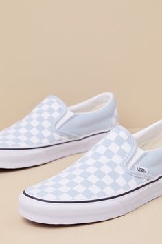 You'll reach for the Vans Classic Baby Blue & White Checkerboard Slip-On Sneakers time and time again when you want to create casually cool looks! These timeless sneakers have a sturdy canvas construction that creates a sleek silhouette with a rounded toe upper, elastic gussets at the sides, and a low-cut, padded collar. Iconic baby blue & white checkerboard design accents throughout. The effortless slip-on design makes these shoes essential when you have places to go and things to do! Logo tag