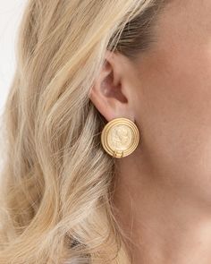 When in Rome, we wear Susan Shaw! Our Roma Coin Studs were made by molding an ancient Roman coin to a more refined and modern style. Bold, gold, and timeless, we think all roads should lead to you having these earrings in your jewelry box. Coin Earrings Gold Indian, Elegant Yellow Gold Medallion Earrings, Yellow Gold Medallion Brass Earrings, Gold Coin Pendant Earrings, Elegant Gold Coin-shaped Earrings, Elegant Gold Coin Earrings, Elegant Yellow Gold Earrings With Coin Pendant, Timeless Gold Clip-on Earrings, Gold Coin Earrings