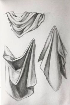 a pencil drawing of some cloths on a white paper