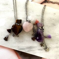 Crystal Necklaces that hold essential oil or your favorite fragrance. We have tigers eye heart necklace, rose Quartz heart necklace or amethyst necklace.  Each one includes a small tub place your favorite essential oil or fragrance inside. Also includes a pouch for storage. We added little lucky charms.  These are cute and unique. Amethyst Heart Charm Necklace As A Gift, Amethyst Amulet Jewelry For Gifts, Amethyst Amulet Necklace For Meditation, Handmade Amethyst Amulet Crystal Necklace, Amulet-style Crystal Pendant Necklace For Gift, Small Tub, Necklace Amethyst, Tigers Eye Necklace, Rose Quartz Heart