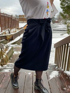 "Women's Vintage Wool Skirt.  Size 10 skirt by \"Roue\"Made of pure virgin wool. Fits true to size. Midi length with high waist and large bow tie. Paper bag style. Lovely vintage condition, zipper back and fully lined. Measured flat and in inches. Waist - 15 in Hips - 21 in Length - 29 in" Winter Lined Black Pencil Skirt, Little Black Skirt, Vintage Wool Skirt, Sarah White, Rock Vintage, Skirt Knee Length, Office Skirt, Large Bow, Wool Skirt