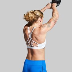 We made our Warrior Sports Bra because a cute, flattering, and strappy back design shouldn't mean your sports bra lacks support. Meet your new workout Warrior—designed for athletic builds, this bra won’t dig in or restrict your movement and provides the perfect amount of coverage and compression through any activity. Sports Bra With Built-in Bra For Training, Sports Bra With Built-in Bra For Yoga, Training Sports Bra With Built-in Bra And 4-way Stretch, Compressive No-show Sports Bra With Built-in Bra, Training Tank-shaped Sports Bra With Built-in Bra, Warrior Workout, Athletic Build, White Sports Bra, Sports Bra