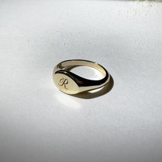 HOW TO PLACE YOUR ORDER; Select the metal finish you would like for your ring to be, and then provide the desired font and letter you would like. You can have up to 3 letters engraved on the ring but they must all be the same font. Letters will be engraved in the order that they are provided and will all be the same font size (No monogram style without specifically requesting in messages). Gold Letter Ring, Personalized Adjustable Symbolic Signet Ring, Adjustable Symbolic Personalized Signet Ring, Adjustable Personalized Symbolic Signet Ring, Symbolic Initial Ring For Gift, Personalized Oval Initial Ring For Promise, Classic Initial Ring For Personalized Gift, Symbolic Signet Ring With Initials For Gift, Oval Stamped Initial Ring For Gift