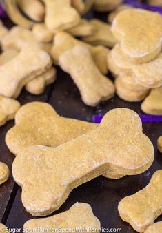 dog biscuits and bone shaped treats on a table