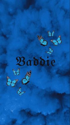 some blue butterflies flying in the sky with words babble on it's side