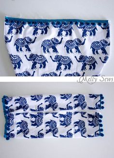 two pictures of the same blue and white fabric with elephants on it, one has pom poms