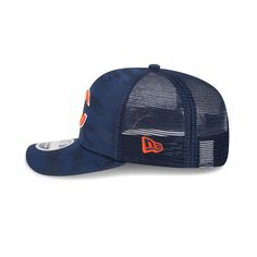 The Chicago Bears Camo 9SEVENTY Trucker features an embroidered Bears logo at the front panels with a matching New Era Flag at the left-wear side and a snapback closure at the rear. Collegiate Trucker Hat With Curved Brim For Streetwear, Collegiate Style Trucker Hat With Curved Brim For Streetwear, Collegiate Streetwear Trucker Hat With Curved Brim, Urban Trucker Hat With Curved Visor For Baseball Season, Collegiate Flat Bill Trucker Hat For Streetwear, Navy Snapback Hat With Embroidered Logo For Streetwear, Navy Casual Snapback Hat For Streetwear, Urban Trucker Hat With Flat Bill For Baseball Season, Urban Style Trucker Hat For Baseball Season