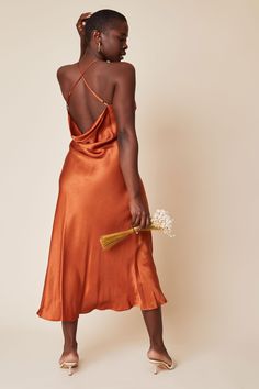 Turn every head in this sexy and sophisticated slip dress! The Fiona dress has adjustable straps for the right fit, while the bias cut creates an elegant cowl back and midi-length flare at the bottom. Chic Formal Slip Dress With Cowl Back, Elegant Slip Dress With Bias Cut And Cowl Neck, Satin Midi Dress With Back Opening, Backless Midi Dress With Adjustable Straps For Evening, Backless Midi Dress With Adjustable Straps, Evening Backless Midi Dress With Adjustable Straps, Elegant Backless Midi Dress With Adjustable Straps, Chic Cowl Neck Slip Dress For Evening, Summer Fitted Slip Dress With Cowl Back