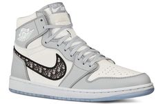 Dubbed “the most luxurious Air Jordan 1 ever”, all 8500 pairs of available Air Diors were made entirely in Italy with the finest materials and craftsmanship. The upper is constructed with white and Dior grey leather, where oblique monogrammed Swooshes enhances the opulent look. Underfoot, an translucent icy outsole completes the design. Sepatu Air Jordan, Air Dior, Doudoune The North Face, Men Dior, Jordan 1 High Og, Nike Basketball Shoes, Air Jordan 1 Retro High, Nike Air Jordan 1, Jordan 13