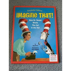 a book with the title imagine that written by dr seuss and cat in the hat