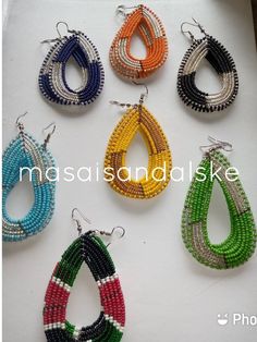 Setof 7 wholesale earrings Go ethnic with our African Maasai tribal earrings skillfully made with passion and ancient jewelry making tradition of the Maasai people of Africa Traditional Multicolor Beaded Earrings Nickel Free, Handmade Traditional Multicolor Hoop Earrings, Handmade Multicolor Traditional Hoop Earrings, Traditional Handmade Multicolor Hoop Earrings, Colorful Traditional Earrings, Traditional Colorful Round Bead Earrings, Handmade Multicolor Teardrop Hoop Earrings, Traditional Colorful Earrings With Dangling Beads, Colorful Traditional Earrings With Dangling Beads