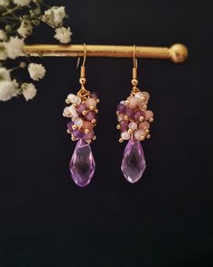 Premium Collection Earrings 'Enchanting pale purples, showered by the waterfall of delicate rose quartz, mysterious amethyst and moonstone. These earrings will be in it with any of your everyday looks, giving you more shine and distinction.' Stunning elegant earrings, with natural gemstones and glass crystals great for everyday wear or special occation complimanting your outfit, making you even more breathtaking. They are lightweight and comfortable to wear. All materials are authentic carefully Elegant Purple Gemstone Chandelier Earrings, Elegant Gold Amethyst Chandelier Earrings, Purple Amethyst Gemstone Chandelier Earrings, Purple Multi-stone Dangle Earrings, Luxury Gemstone-accented Chandelier Drop Earrings, Spring Blossom, Unique Jewelry Designs, Elegant Earrings, Gold Plated Silver