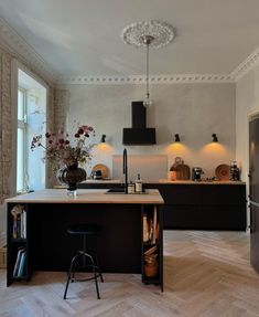 the kitchen is clean and ready to be used as a dining room or office space