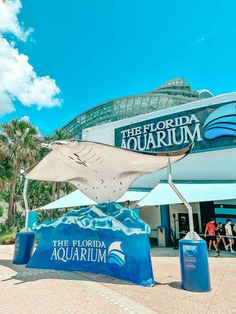 the florida aquarium sign in front of it