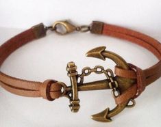 Leather Anchor bracelet Anchor jewelry Nautical bracelet | Etsy Handmade Adjustable Nautical Bracelets, Handmade Nautical Adjustable Bracelets, Brown Bracelet With Lobster Clasp As Gift, Nautical Anchor Bracelets As Gift, Nautical Anchor Bracelet As Gift, Nautical Anchor Bracelet Gift, Vintage Adjustable Charm Bracelet For Everyday, Adjustable Nautical Bracelets For Everyday, Adjustable Nautical Style Bracelets For Everyday