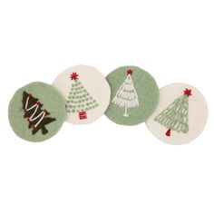 three green and white christmas tree coasters