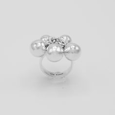 "DON 925's master silversmiths handcrafted with genuine sterling silver this statement ring that features a fun spheres design. Band width: 5 mm (0.20\") Approx. sphere size: 9 mm (0.35\") Weight: 10 grams (0.35 oz) Stamped with \"925\" the quality hallmark and place of origin \"Mexico\". Best way to keep your item shiny and clean is by leaving it on while you wash your hands with warm soapy water, dry ring thoroughly and gently. ★Premium DON925 bag included ★FAQs: https://www.etsy.com/shop/don9 Sphere Design, Full Finger Rings, Bubble Ring, Unusual Rings, How To Clean Metal, Ocean Jewelry, Statement Ring Silver, Oxidised Jewellery, Modern Ring