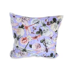 a purple and white pillow with flowers on it