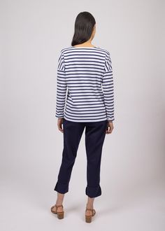 Elevate your French-girl game with this latest addition to our authentic Breton shirt collection! Tailored from our all-time best-seller shirt, MINQUIERS MODERNE, the MINQUIERS DROP features a more relaxed silouhette with dropped shoulders while maintaining the boyfriend fit and comfortable cotton we love. Made in Saint-James, Normandy, France. 100% lightweight cotton jersey. Navy Cotton Marine Style Tops, Navy Marine Style Cotton Top, White Marine Style Cotton Tops, Marine Style Cotton Crew Neck Top, Navy Long Sleeve Marine Top, Navy Casual Tops For Work, Casual Navy Tops For Work, Marine Style Long Sleeve Cotton Tops, White Marine Style Long Sleeve Top