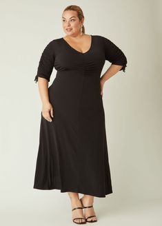 The illusion of drawstring sleeves offers a laidback vibe to this chic a-line maxi dress with complimenting ruching and a sexy V-neck. Black Dress Work, Red Holiday Dress, Dresses Date Night, Ruched Maxi Dress, A Line Maxi Dress, Ashley Stewart, Maxi Dress Online, Midi Dress Casual, Maxi Knit Dress