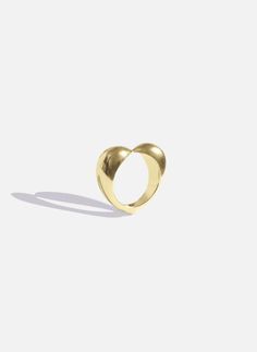 The Éternal Cloud Ring is crafted in 18K gold that captures the spirit of an iconic symbol balancing symmetry and substance. A bold sculptural heart that can be worn and cherished. Timeless Gold Plated Anniversary Rings, Modern Gold Plated Dome Ring For Anniversary, Elegant Dome Ring For Promise, Gold Dome Ring For Promise, Gold Round Dome Promise Ring, Yellow Gold Brass Rings For Anniversary, Fine Jewelry Brass Rings For Anniversary, Timeless Brass Ring Perfect As A Gift, Timeless Brass Ring As Gift