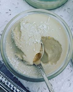 a spoon is in a bowl filled with ice cream