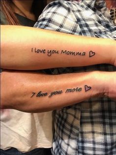 two people with tattoos that say i love you momma and i love you miss me