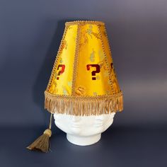 This handmade lampshade hat is a one of a kind, meme cuisine original! This funny and unique LED costume hat makes the perfect accessory for raves, festivals, costume parties, and more. This novelty hat comes with a built in LED disco ball light. This sound activated party light is attached to the top of the bucket hat via velcro, so it is removable. It is lightweight and comfortable, and shines through the fabric of the hat. It projects rainbow patterns onto the ceiling, and changes to the beat of the music (see video). It is rechargeable with a micro USB cable, which is included. Light lasts around 4 hours. Charge time is 1-1.5 hours Light dimensions are 5.5cm x 5.5cm x 5.5cm **Pull cord is NON FUNCTIONAL! The light is turned on/off with a button on the side CONSTRUCTION: The hat is buil Kind Meme, Lampshade Hat, Disco Ball Light, Led Costume, Novelty Hats, Costume Parties, Unique Hats, Cooling Blanket, Pink Leopard Print