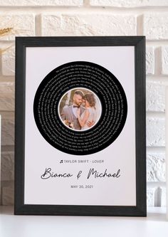 a personalized photo frame with the names of two people and their names on it