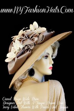 Ladies Camel Beige Tan Wide Brim Designer Kentucky Derby Hat. This Fashion Hat, Is Trimmed With A Large Black Bow, Adorned With Ivory, Beige, Burgundy, And Black Feathers. This Dress Hat, Is Suited For Winter, Spring, Summer Or Fall. A Perfect Special Occasion Hat, For Church, A Wedding, Formals, Holidays, Easter, Horse Racing Events, Horse Races, The Kentucky Derby, The Belmont Stakes, The Preakness, Aqueduct Raceway, And A Tea Party. Custom Made And Designed By NY Fashion Hat Millinery - www.N Special Occasion Hats, Mother Of The Bride Hats, Church Lady Hats, Ladies Dress Hats, Horse Races, Royal Ascot Hats, Belmont Stakes, Occasion Hats, Luxury Hats