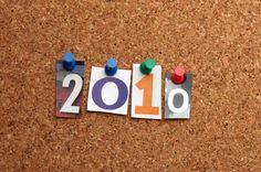 the word 2010 spelled out with magnets on a cork board