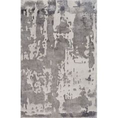 an abstract rug with grey and white colors