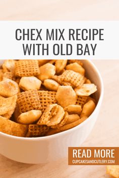 cheesy mix recipe with old bay crackers in a white bowl on a wooden table