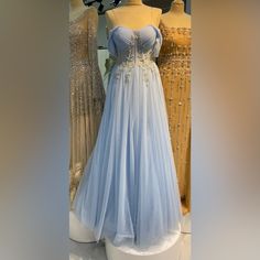 Beautiful Sky Blue Gown With Lined Corset Portion. Worn Once, Size Small Blue Spring Gown With Sweetheart Neckline, Blue Floor-length Evening Dress For Debutante Ball, Blue Gown With Sweetheart Neckline For Spring, Blue Tulle Gown For Homecoming, Blue Tulle Maxi Gown, Light Blue Floor-length Evening Dress For Debutante Ball, Blue Gown With Sweetheart Neckline For Prom, Light Blue Floor-length Gown For Prom Season, Spring Blue Evening Dress For Debutante Ball