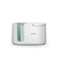 the cricut blender is white and has a green handle on it's side