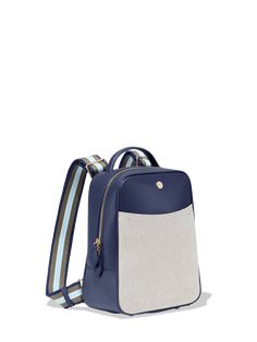 a small backpack that is blue and white with stripes on the front, two straps at the bottom