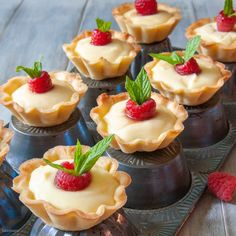 small tarts with fresh raspberries on top