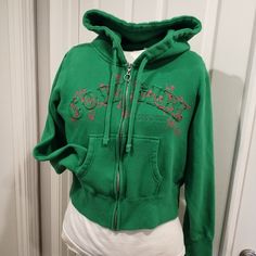 Cowgirl Hardware Green Embroidered Hoodie Sweatshirt Size Medium. Heavy Full Zip Hoodie In Lovely True Kelly Green With Bright Pink Embroidery. Applique Across Front, Embroidered Large Horseshoe Design Back Shoulder. Nwot, New, Washed Never Worn, A Gift For My Daughter She Outgrew Before Wearing. Cute Hoodie. Spring Casual Hoodie With Embroidered Logo, Casual Spring Hoodie With Embroidered Logo, Green Hooded Top For College, Trendy Winter Top With Embroidered Logo, Trendy Embroidered Logo Hoodie For Fall, Green Hooded Sweatshirt, Trendy Fall Hoodie With Embroidered Logo, Casual Long Sleeve Hoodie With Embroidered Logo, Casual Embroidered Hoodie For College