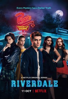 the movie riverdale is shown in front of a neon sign with people standing around it