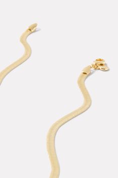 Add some shine to your neckline with this chic gold snake chain by Gorjana. The timeless design makes it versatile enough to wear every day while instantly elevating your look. Timeless 14k Gold Snake Chain Necklace, Classic 14k Yellow Gold Snake Chain Necklace, 14k Yellow Gold Snake Chain Necklace, Gorjana Venice Bracelet, Minimalist Yellow Gold Snake-shaped Necklace, Gorjana Jewelry, Gold Snake Chain, Brand Style Guide, Shoe Size Conversion