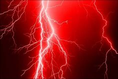 red and white lightning strikes in the night sky