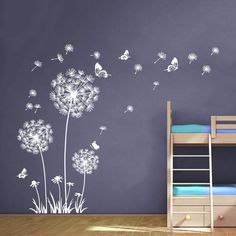 the dandelion wall decal is shown in this child's room with blue walls