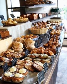 many different types of baked goods on display