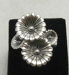 Sterling silver ring 925/1000, flower. Stamped 925.Approximate weight 6.5 grams. Top width 2.8 cm (1.12 inches). All our jewels are made from solid sterling silver 925/1000 and are carefully crafted by hand in our family workshop. We dispatch your orders in 5 working days, worldwide and the postage is $5. We ship registered priority mail. Please allow 5-7 working days for delivery in Europe and 10-15 working days outside Europe. For any questions - please do not hesitate to contact me! Sterling Silver Jewelry With 3d Flowers In Silver, Vintage Flower Ring Stamped 925, Hallmarked Silver Flower Ring, Unique Silver Flower Shaped Ring, Silver Flower Ring Stamped 925, Hallmarked Sterling Silver Flower Ring, Nature Rings, Silversmithing Jewelry, Nature Ring