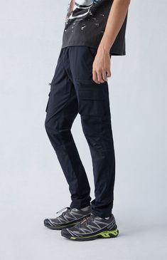 Casual meets cool with the new Stretch Black Slim Cargo Pants from PacSun. This go-to pair is designed with an elastic stretch waistline, adjustable drawstrings, side pockets, zip cargo pockets, a drawcord hem, and a slim fit.

Learn more about PacSun eco items Relaxed Fit Hiking Pants With Pockets, Relaxed Fit Cargo Pants With Multiple Pockets For Hiking, Relaxed Fit Cargo Pants For Hiking With Multiple Pockets, Hiking Cargo Pants With Multiple Pockets And Relaxed Fit, Casual Cargo Pants With Hip Pockets For Hiking, Hiking Bottoms With Side Pockets, Straight Leg Cargo Pants With Elastic Waistband For Outdoor, Cargo Pants With Functional Pockets For Outdoor Activities, Tapered Leg Hiking Bottoms With Pockets