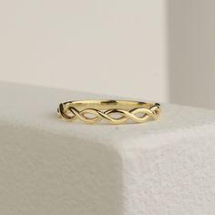 Discover the elegance of our 14k Solid Gold Rope Ring, a perfect choice for minimalist wedding jewellery or a stylish everyday accessory. This beautifully woven design exudes authenticity and sophistication. Key Features: - Crafted from genuine 14k solid gold for lasting quality - Unique rope design adds texture and visual interest - Available in various sizes for a perfect fit - A timeless piece that complements any outfit Our gold band ring is not only a stunning addition to your collection but also an eco-friendly choice. Each ring is sustainably crafted, ensuring you wear a piece of jewellery that aligns with your values. Have questions? We're here to help you find the ideal ring for your special moments.  Elevate your style with this exquisite piece today. Act fast--this unique ring i Wedding Ring Woven, Braided Wedding Rings, Minimalist Wedding Jewelry, Braided Wedding Band, Textured Gold Ring, Best Friend Rings, Simple Wedding Bands, Friend Rings, Rope Ring