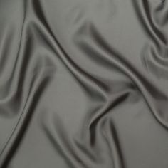 a close up view of a gray fabric