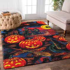 a colorful area rug with pumpkins on it